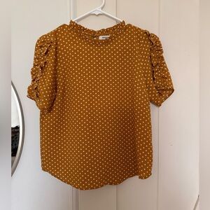 Yellow and white polka dot blouse